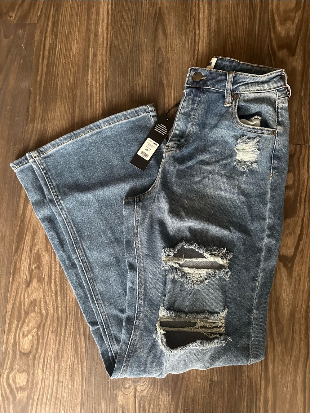 Fashion Nova Ripped Light Blue Wide Leg Jeans